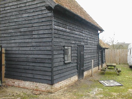 The former stables, rebuilt using traditional methods where possible