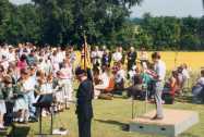 David leads the service; the British Legion flag-bearer stands alongside