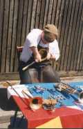 Iain Schofield repairs a musical instrument