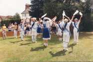 Morris Dancers on the green near the old bus shelter