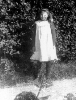 A schoolgirl from a Collier postcard of the school