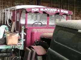 1920's lorry behind a 1950's Bedford van