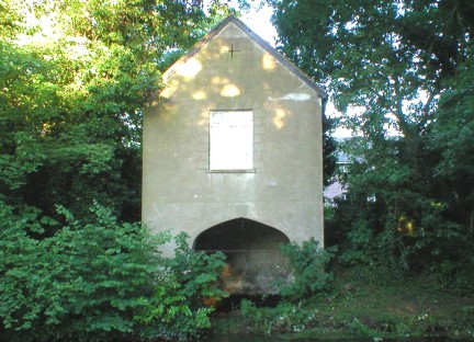 The old Boathouse from the River - with evening sunshine on the window