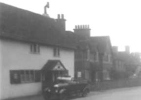 The Swan, the two tied cottages, Mileham Cottage and beyond