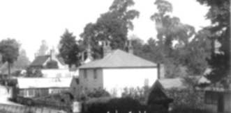 Whitewell Cottage, with Well in the front, workshops to left and Peacock Cottage to right