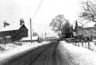 School Road, with Lanka House on left and New Cottages on right
