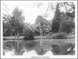 Arborfield Grange from across the lake