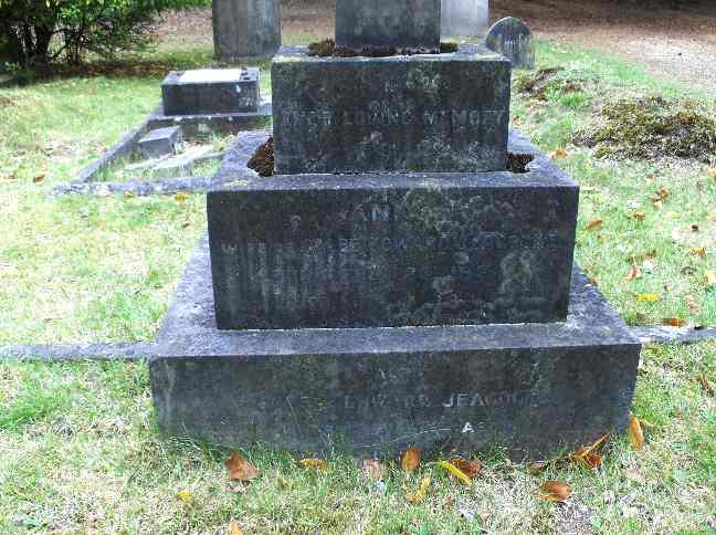 The front pedestal of the cross, engraved with the names of Ann and Caleb Jeacocke 