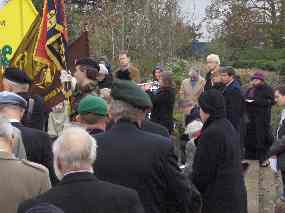 Flags are raised and traffic moves again as the 'Reveille' is sounded