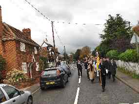 The procession passes the 'Swan' and 'Sunrise'