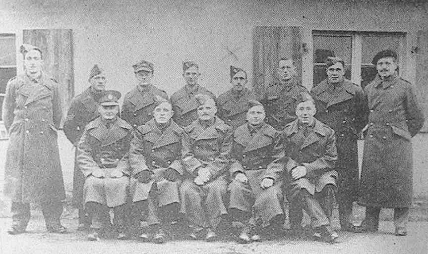 Alec W. Verrall, of Arborfield (fourth from right, back row), who has been a prisoner of war in Germany since June 1940