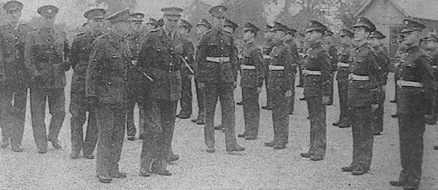 'Lt.-General Sir John Crocker, General Officer Commander-in-Chief, Southern Command, inspecting boys of the Army Technical School at Arborfield'