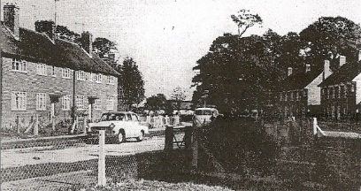 Photo of existing road, fencing and gardens